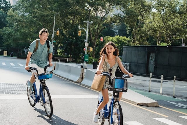 A-boy-and-girl-riding-bicicle-self-activities